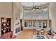 Bright living room features a large bay window with a fireplace and hardwood floors at 310 Westbourne Dr, Tyrone, GA 30290