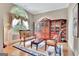Elegant sitting room with a large window, detailed drapery, and furniture at 310 Westbourne Dr, Tyrone, GA 30290
