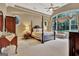 Large main bedroom features an arched window and decorative fixtures at 310 Westbourne Dr, Tyrone, GA 30290