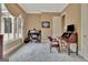 This home office features a large window, allowing for lots of natural light at 310 Westbourne Dr, Tyrone, GA 30290