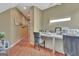 Bright office with hardwood floors and desk area with natural light shining in at 310 Westbourne Dr, Tyrone, GA 30290