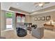 Cozy recreation room with plush seating, foosball table, and access to the outdoors at 310 Westbourne Dr, Tyrone, GA 30290