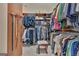 A spacious walk-in closet with custom shelving and hanging storage solutions at 310 Westbourne Dr, Tyrone, GA 30290