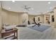 Spacious workout room with durable gray laminate flooring and ceiling fans at 310 Westbourne Dr, Tyrone, GA 30290