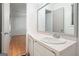 Bathroom featuring white vanity, and a large mirror at 7025 Stone Wood Nw Dr, Kennesaw, GA 30152