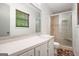 Updated bathroom with tiled shower and neutral finishes at 7025 Stone Wood Nw Dr, Kennesaw, GA 30152