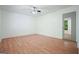 Bedroom featuring laminated wood floors, and a door with mirror at 7025 Stone Wood Nw Dr, Kennesaw, GA 30152