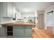 Bright and airy kitchen with green accents, butcher block counters, and modern appliances at 7025 Stone Wood Nw Dr, Kennesaw, GA 30152