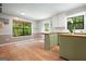 Updated kitchen with butcher block countertops, stainless steel appliances, and ample natural light at 7025 Stone Wood Nw Dr, Kennesaw, GA 30152