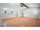 Bright and open living room with hardwood floors and great natural light at 7025 Stone Wood Nw Dr, Kennesaw, GA 30152