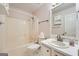 The bathroom includes a tub-shower, sink, mirror, and cabinet, providing all essential amenities at 113 Hitchcock Dr, Villa Rica, GA 30180