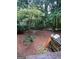 Spacious backyard featuring mature trees and a natural landscape at 974 Bloomfield Dr, Lawrenceville, GA 30044