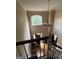 Soaring foyer with a chandelier, a large window, and hardwood floors, creating a grand entrance at 974 Bloomfield Dr, Lawrenceville, GA 30044
