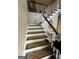 Staircase with carpet runners at 974 Bloomfield Dr, Lawrenceville, GA 30044