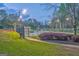 Well-maintained tennis courts with lush landscaping, providing a great amenity for active residents at 974 Bloomfield Dr, Lawrenceville, GA 30044
