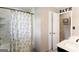 Bathroom with a shower featuring starfish curtain, and a vanity with black hardware and starfish decoration at 3359 Villa Ln, Douglasville, GA 30135