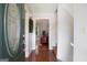 Welcoming foyer featuring hardwood floors and staircase leading to the upper level of the home at 3359 Villa Ln, Douglasville, GA 30135