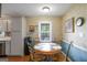 Charming breakfast nook with a round table and chairs, perfect for casual dining at 3359 Villa Ln, Douglasville, GA 30135