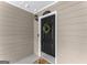 Exterior shot of the front door with a wreath and house number, creating a welcoming entrance at 603 Brighton Pt, Atlanta, GA 30328