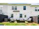Charming backyard with string lights, a fire pit, and comfortable seating at 1316 Willamette Way, Marietta, GA 30008