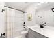 Clean and modern bathroom with a shower-tub combo and a stylish vanity sink at 1316 Willamette Way, Marietta, GA 30008