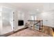 Bright second floor hallway leads to laundry room and bedrooms with neutral colors at 1316 Willamette Way, Marietta, GA 30008