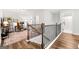 A bright, modern hallway with hardwood floors, leading to a well-lit office space at 1316 Willamette Way, Marietta, GA 30008