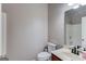 Bathroom with toilet, sink and vanity, and white shower/tub at 2030 Beyers Landing Dr, Buford, GA 30519
