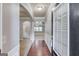Home foyer showing hardwood floors, open spaces, and decorative molding at 2030 Beyers Landing Dr, Buford, GA 30519