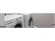 Laundry room with front-load washer and dryer at 2030 Beyers Landing Dr, Buford, GA 30519
