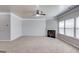 Large living room featuring carpet, fireplace and windows at 2030 Beyers Landing Dr, Buford, GA 30519