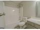 Modern bathroom features a shower-tub combo and a sleek vanity at 3781 Deercreek Dr, Powder Springs, GA 30127