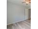 Bedroom with wood-look floors and neutral color palette at 3781 Deercreek Dr, Powder Springs, GA 30127