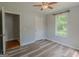 Bedroom showcasing two windows and ample closet space at 3781 Deercreek Dr, Powder Springs, GA 30127