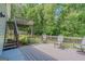 Spacious multi-level deck overlooking private backyard provides ample space for outdoor living at 3781 Deercreek Dr, Powder Springs, GA 30127