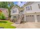 Lovely two-story home with a well-maintained lawn, attached two-car garage, and a charming front entry at 3781 Deercreek Dr, Powder Springs, GA 30127
