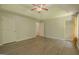 Large main bedroom featuring wood-look floors, neutral walls, and a tray ceiling at 3781 Deercreek Dr, Powder Springs, GA 30127