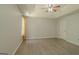 Spacious main bedroom with wood-look floors, tray ceiling, and abundant natural light at 3781 Deercreek Dr, Powder Springs, GA 30127