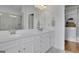 Elegant bathroom features double vanity, quartz counters, and ample cabinet space at 4520 Odum Lake Trl, Cumming, GA 30040
