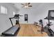 Bright exercise room with modern equipment and hardwood floors at 4520 Odum Lake Trl, Cumming, GA 30040