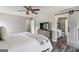 The main bedroom features a barn door leading to the en-suite bathroom at 142 Holly Mill Village Dr, Canton, GA 30114
