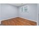 Empty bedroom with hardwood floors and natural light at 1694 Pheasant Dr, Atlanta, GA 30238