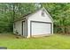 Spacious detached garage with an additional door and ample space at 1694 Pheasant Dr, Atlanta, GA 30238