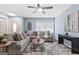 Spacious living room with ample seating, a stylish area rug, and contemporary accents for a cozy yet modern feel at 1694 Pheasant Dr, Atlanta, GA 30238