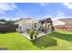 Backyard featuring a patio, pergola, seating area, and well-maintained lawn at 3735 Westhaven Dr, Cumming, GA 30040