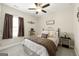 Cozy bedroom with neutral tones, a comfortable bed, and a side table, creating a peaceful retreat at 3735 Westhaven Dr, Cumming, GA 30040