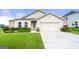 Charming one story home featuring a well-manicured lawn and a two-car garage at 3735 Westhaven Dr, Cumming, GA 30040