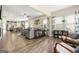 Open-concept living room flows into the kitchen and dining areas, creating a spacious and inviting atmosphere at 3735 Westhaven Dr, Cumming, GA 30040