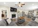 Spacious living room seamlessly connected to the kitchen and dining areas, ideal for modern living and entertaining at 3735 Westhaven Dr, Cumming, GA 30040