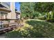 Expansive backyard featuring a well-maintained lawn and a partially shaded deck at 4729 Woodland Brook Se Ct, Atlanta, GA 30339